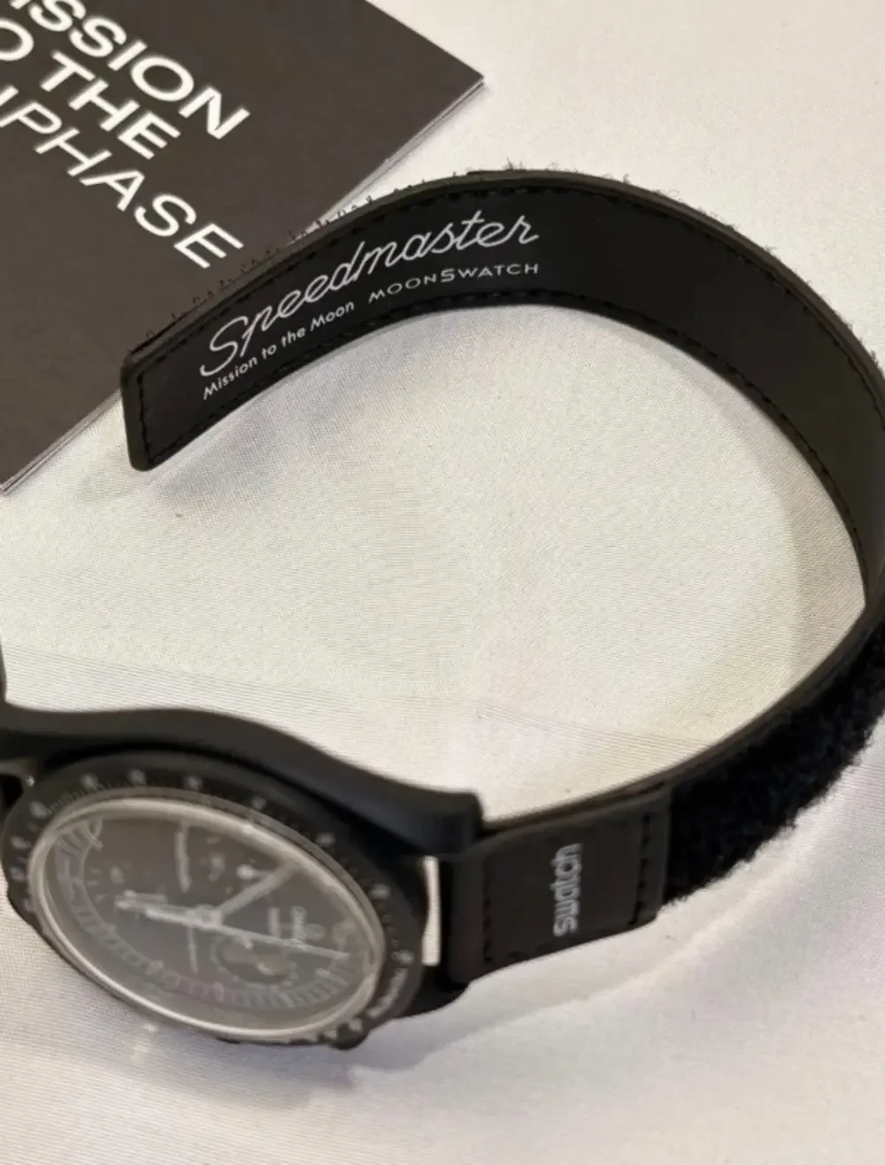 OMEGA x Swatch MISSION TO THE MOONPHASE NEW MOON Black Bioceramic Snoopy Watch.